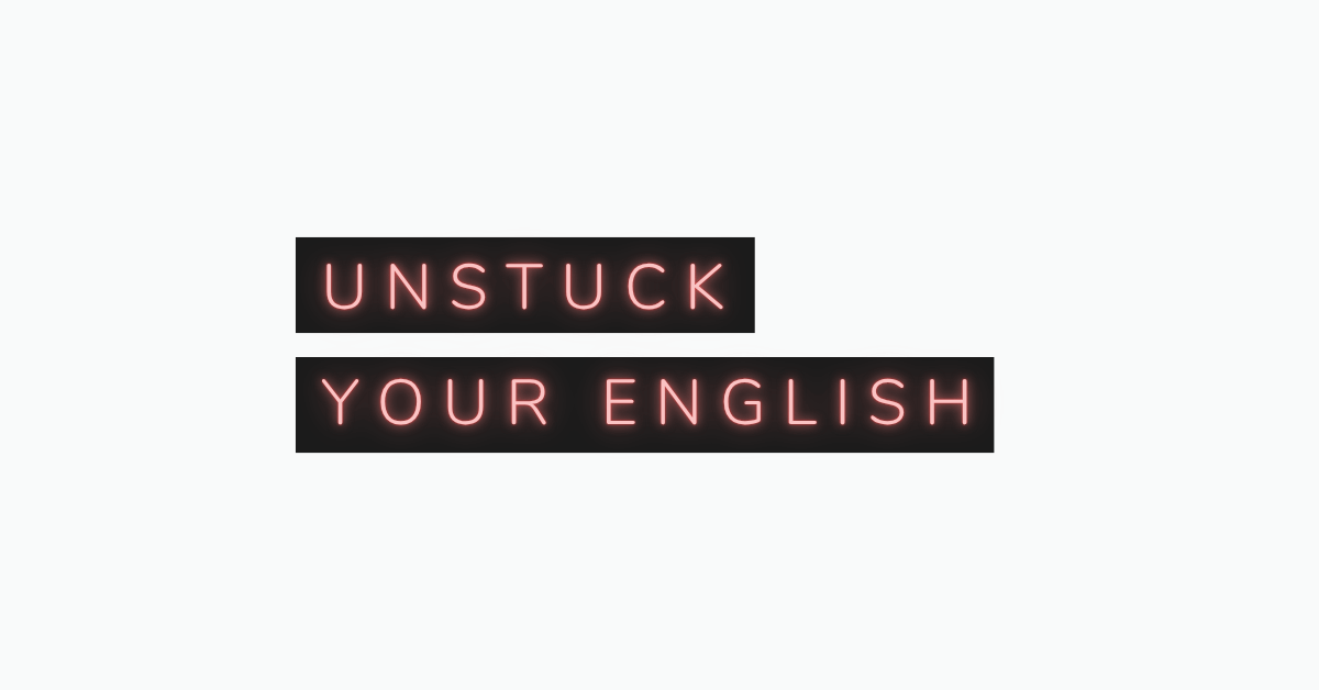 Neon sign reading "Unstuck Your English" against a white background, representing how to improve your English fluency